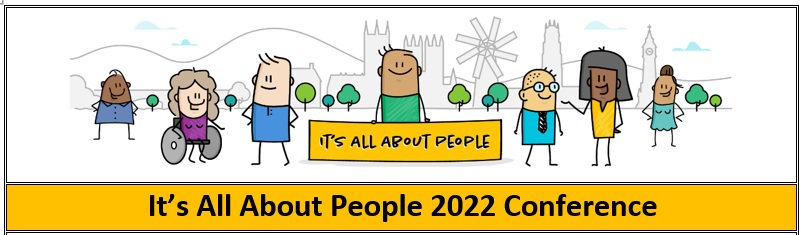 Image of people holding a banner that reads It's All About People 2022 Conference